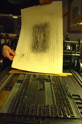A printed sheet next to the type form